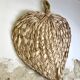 Braided palm leaf eventail
