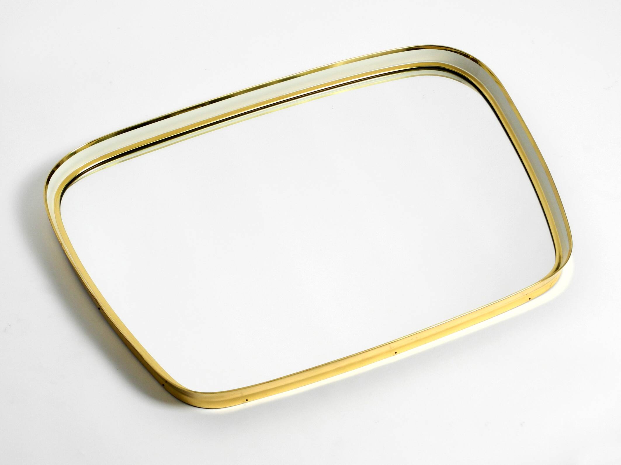 Huge Mid Century "Zier-Form" wall mirror with heavy brass frame with Label