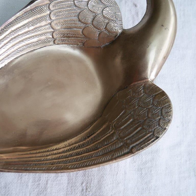 Brass swan pocket empty