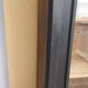 Bookcase black patina shell pediment 2 drawer doors