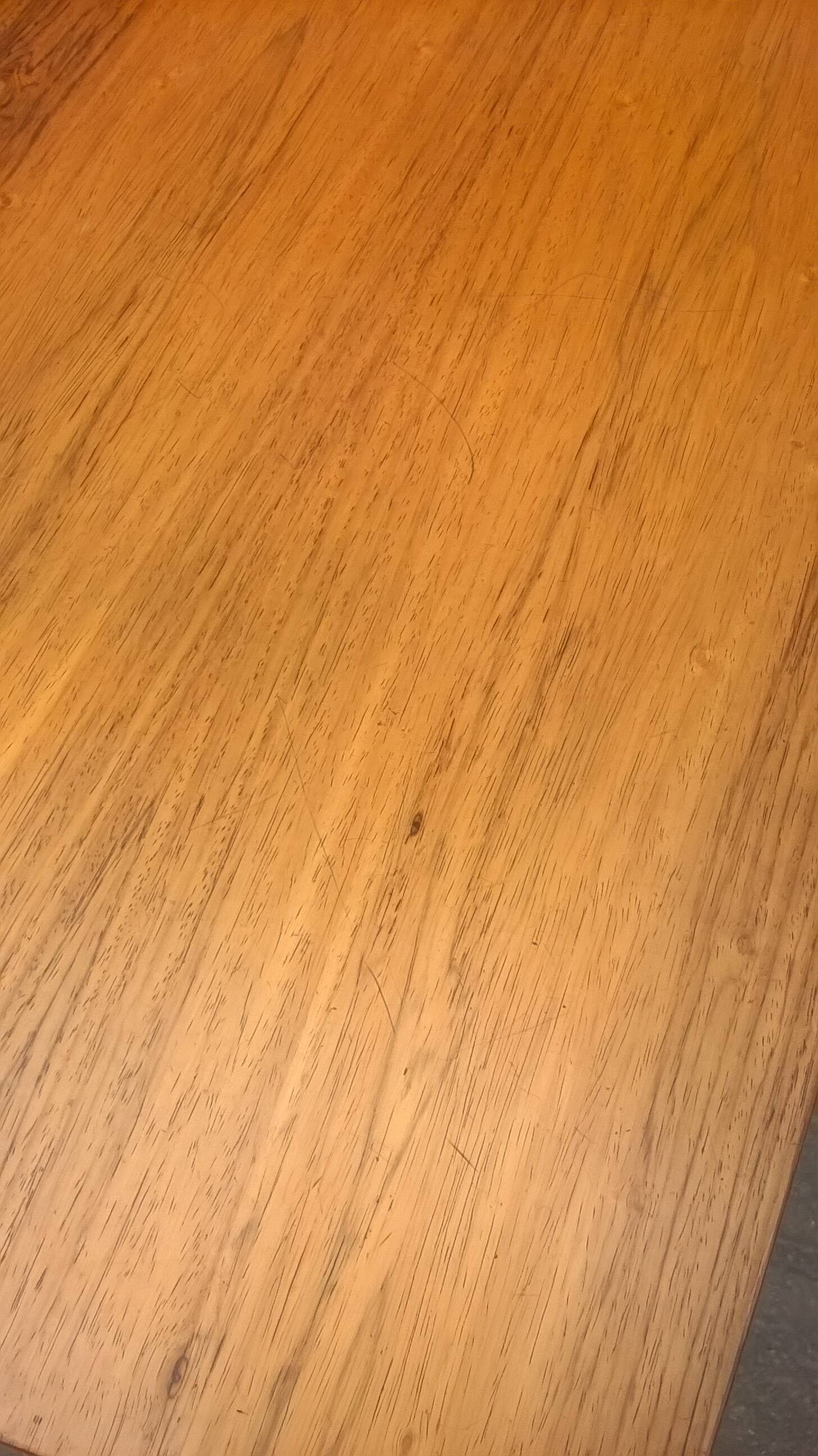 Extendable teak dining table