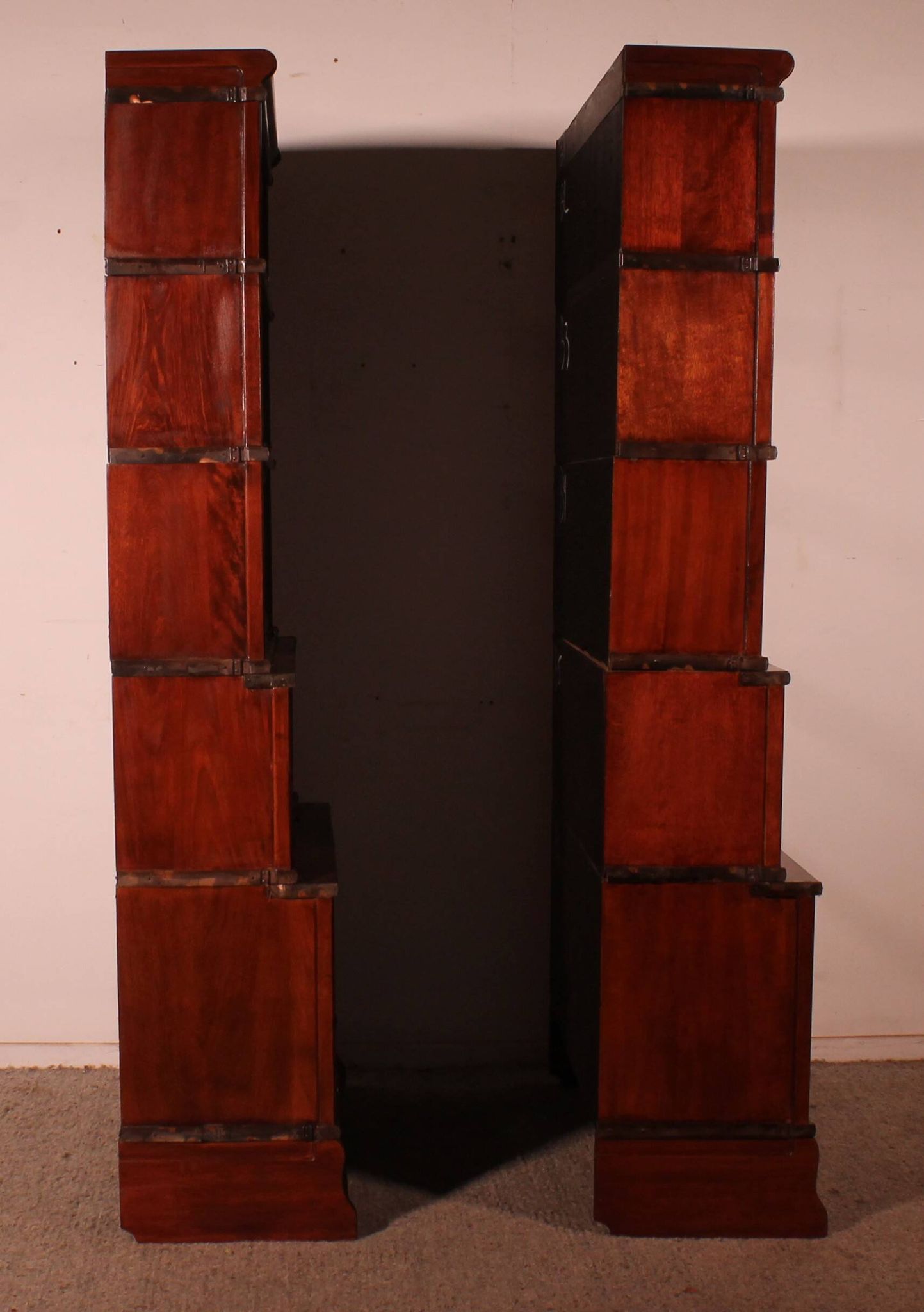 pair of Globe Wernicke London 'waterfall' bookcases in mahogany circa