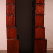 pair of Globe Wernicke London 'waterfall' bookcases in mahogany circa