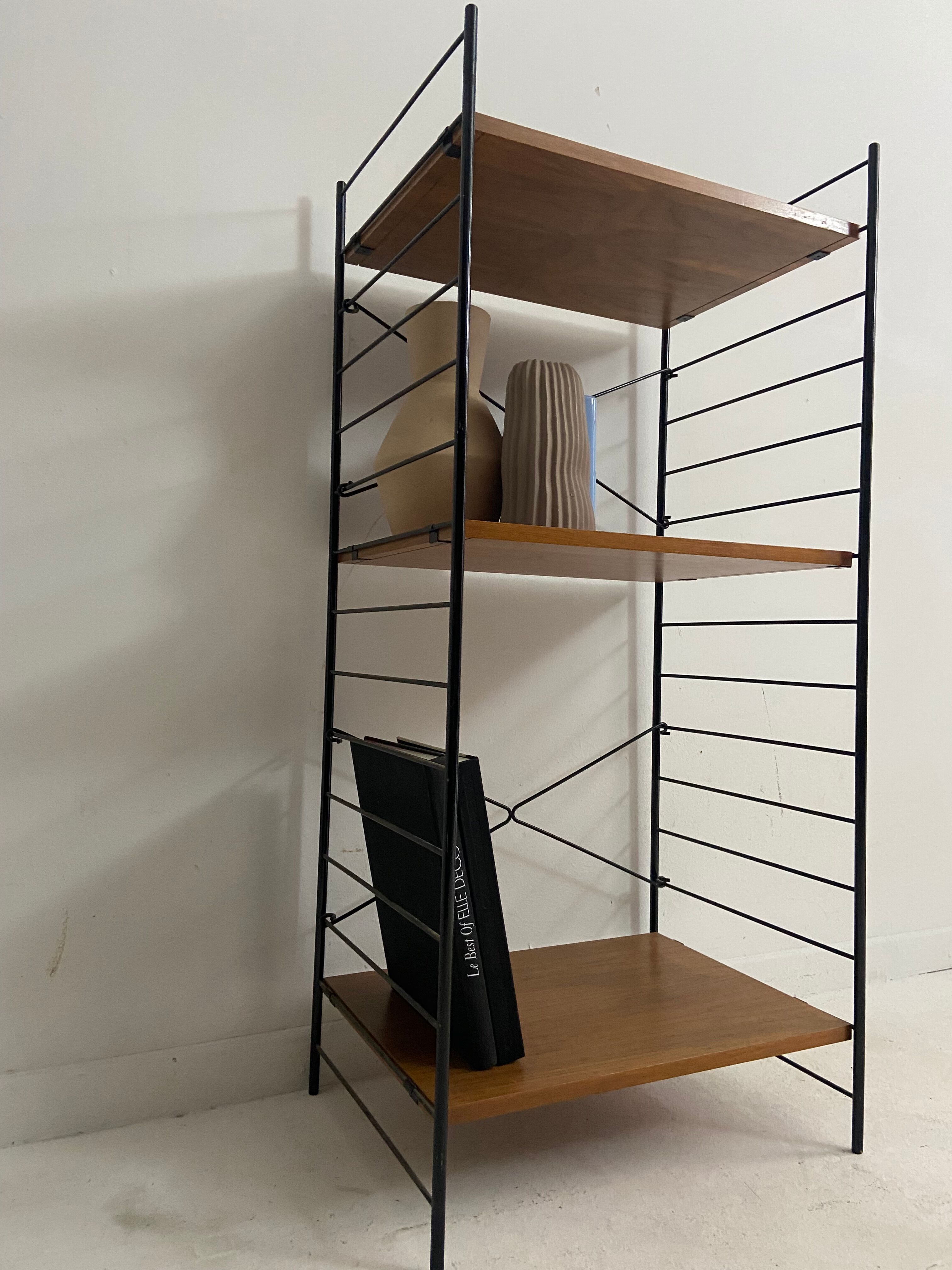 small vintage metal and teak string bookshelf