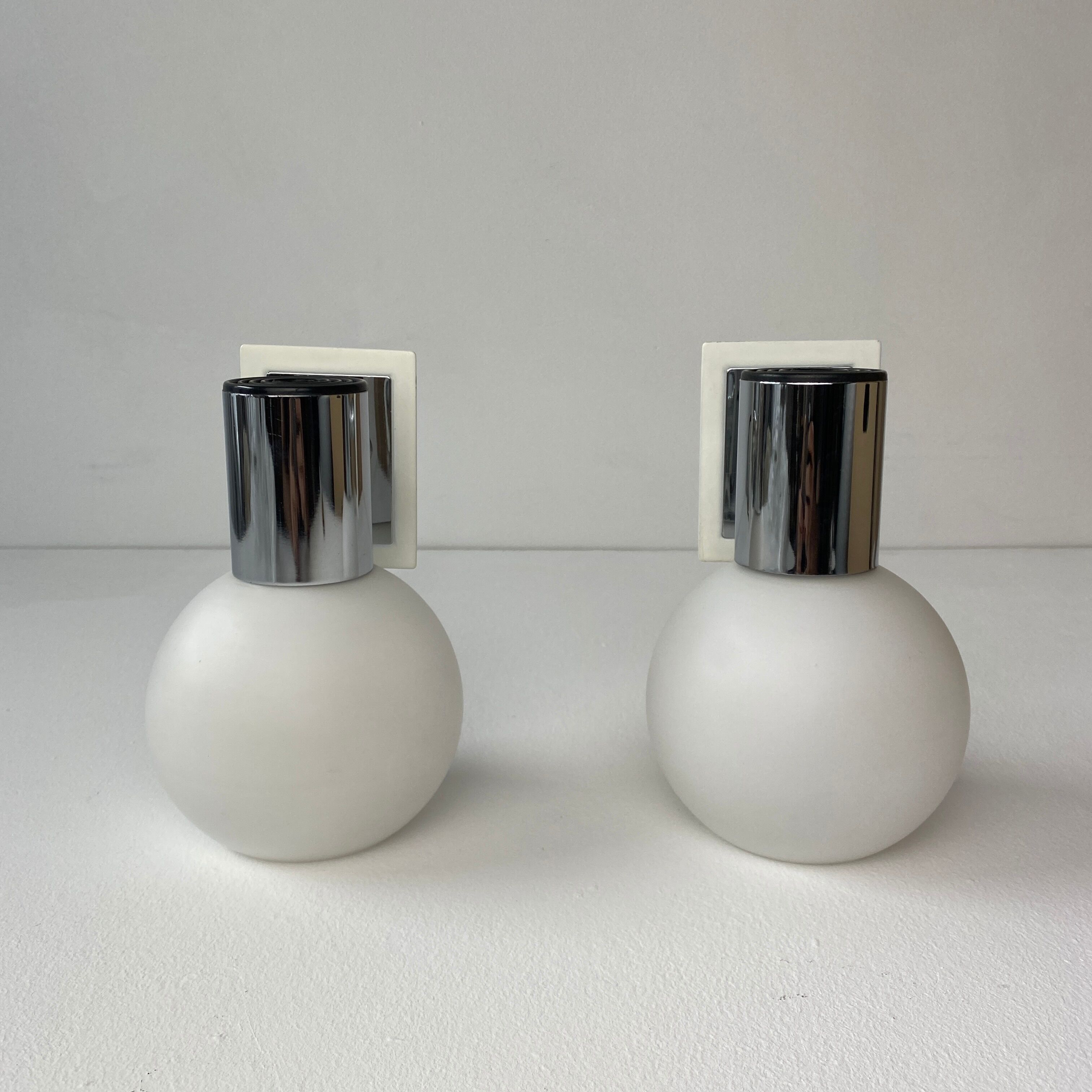 Pair of vintage opaline round wall lamps