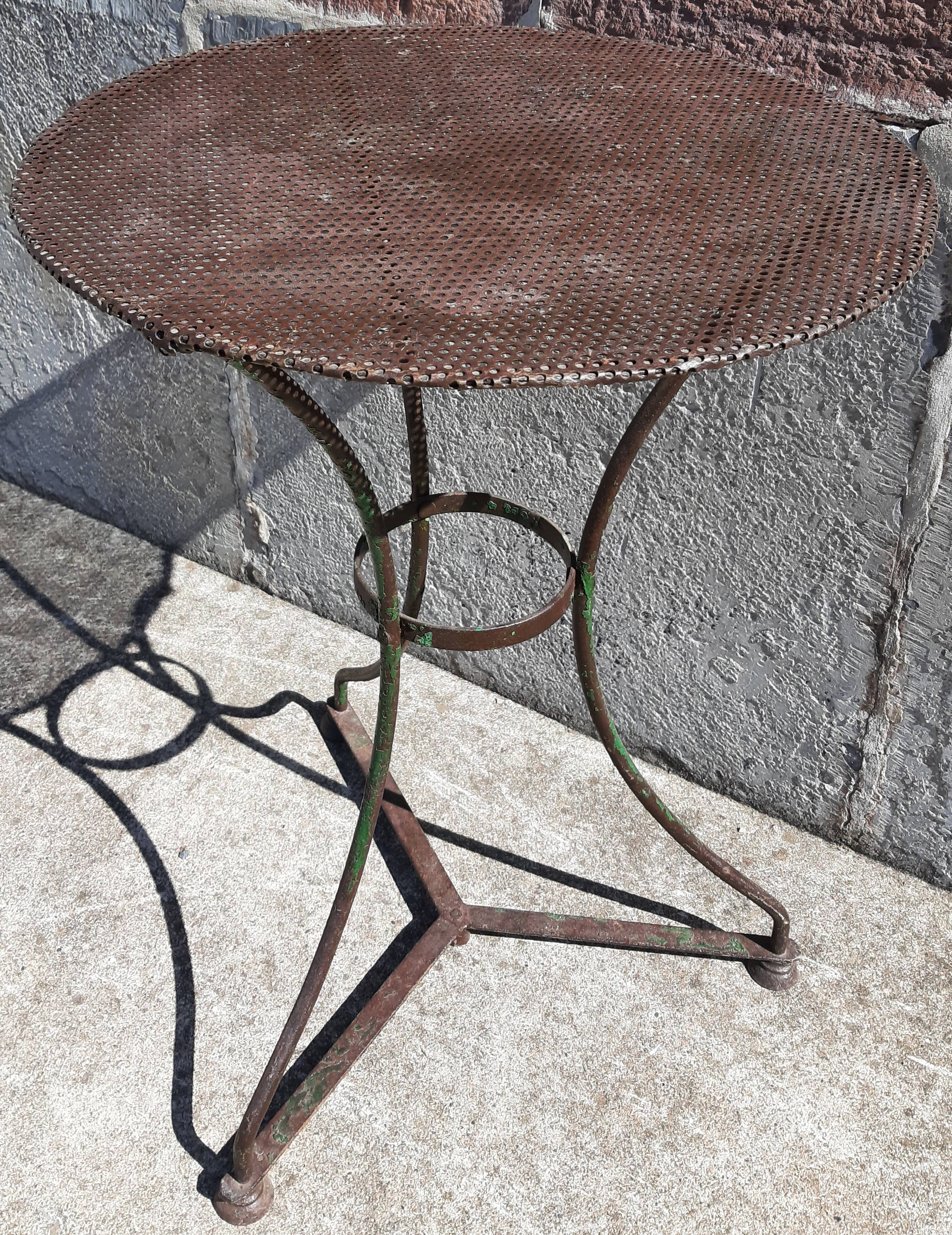 Wrought iron pedestal table
