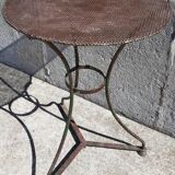 Wrought iron pedestal table