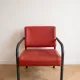 3 red leather and metal armchairs