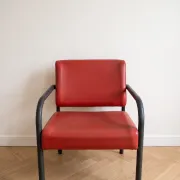 3 fauteuils en cuir rouge et métal