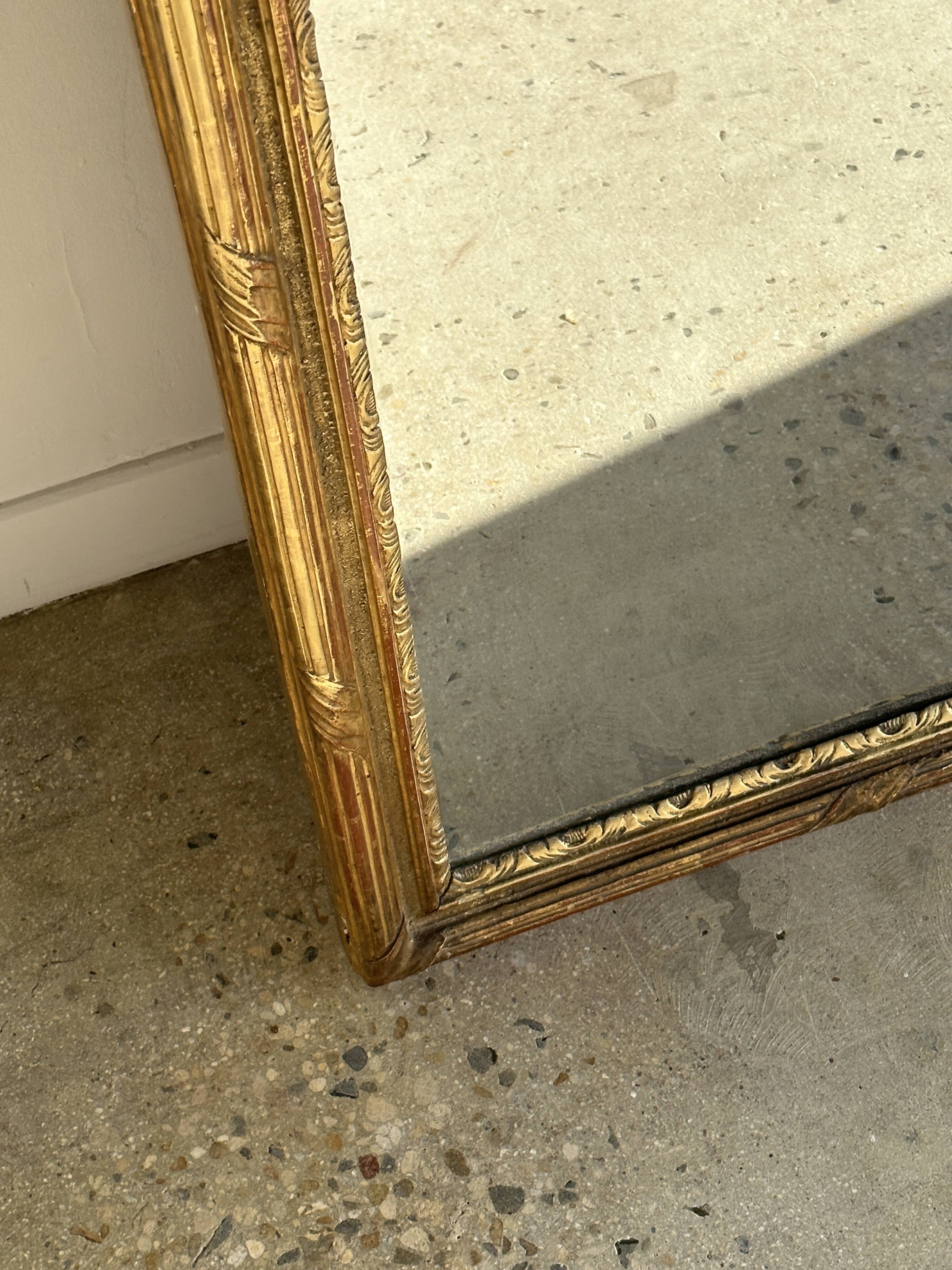 Large gilded mirror 19th century rounded corners mercury glass Louis XVI style