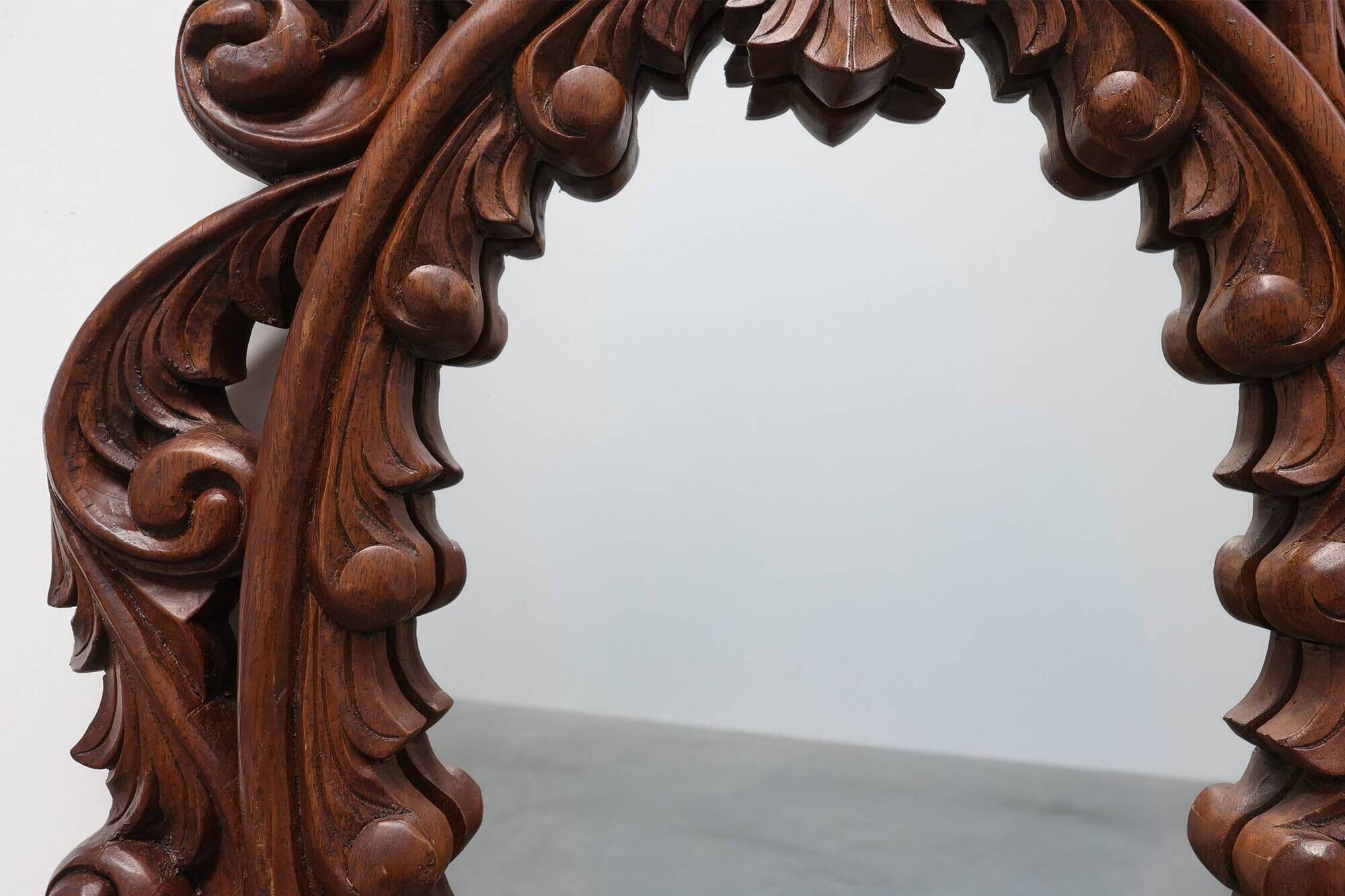 French Carved Walnut Oval Mirror with Pierced Acanthus Crest, circa 1900