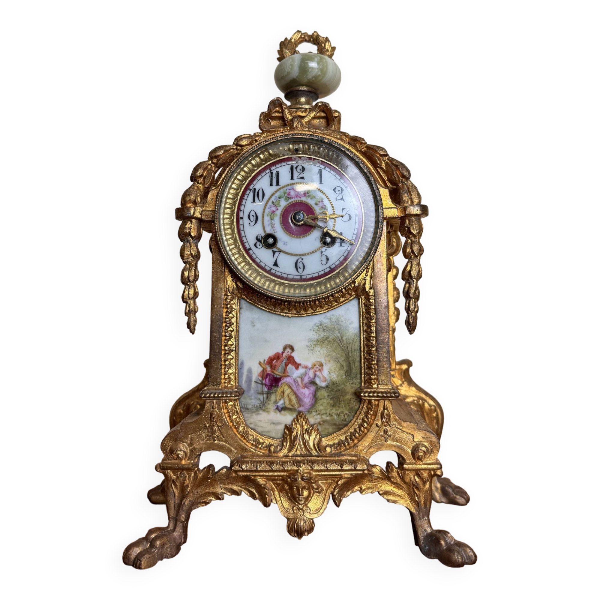 Napoleon III clock in gilded bronze and porcelain plates decorated and painted by hand