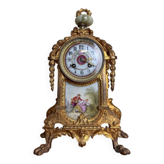 Napoleon III clock in gilded bronze and porcelain plates decorated and painted by hand