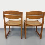 Pair of vintage sleigh chairs in beech wood and cane from the 70s