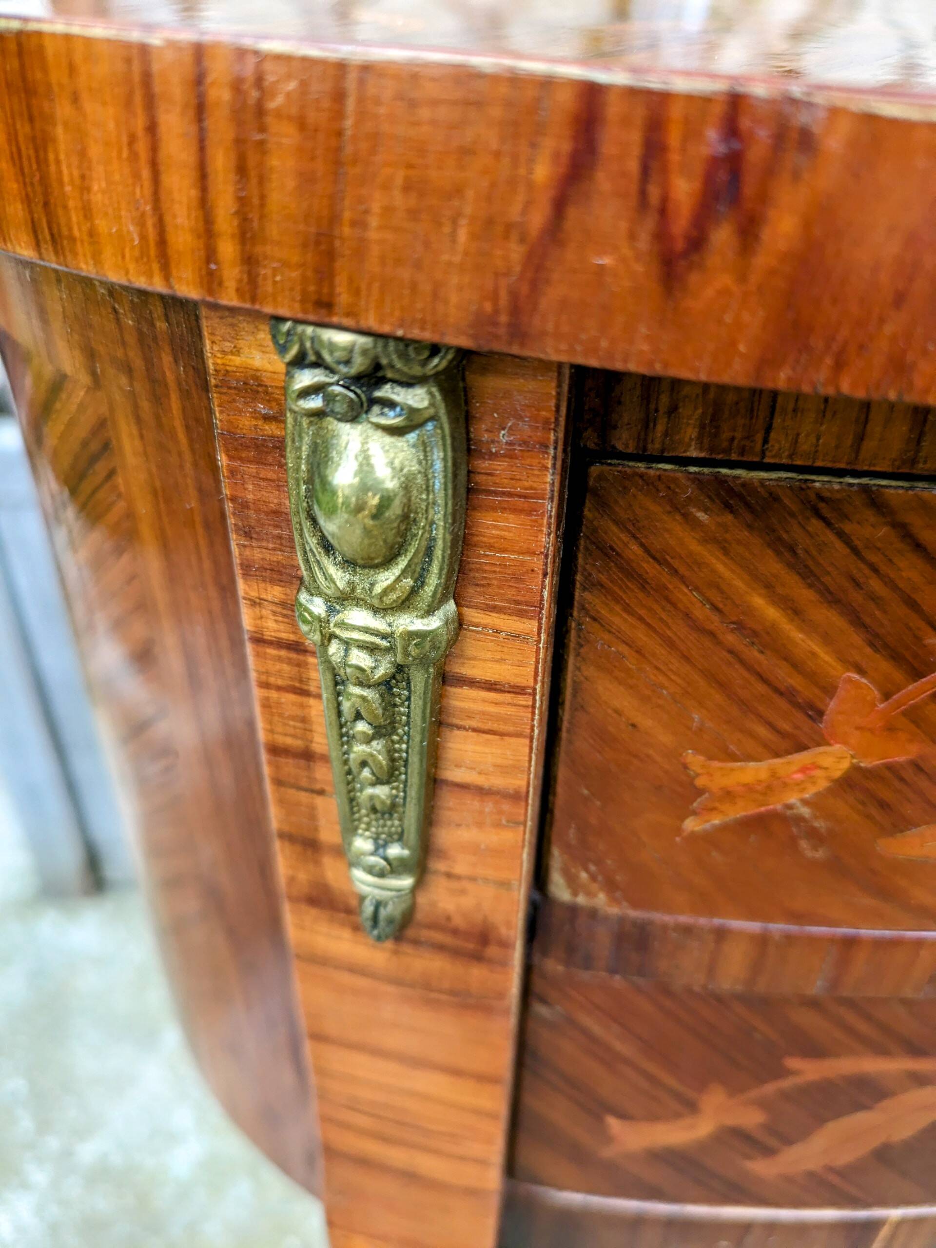 Old oval bedside table in rosewood marquetry Louis XV style
