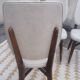Set of 4 white and wooden Scandinavian chairs.