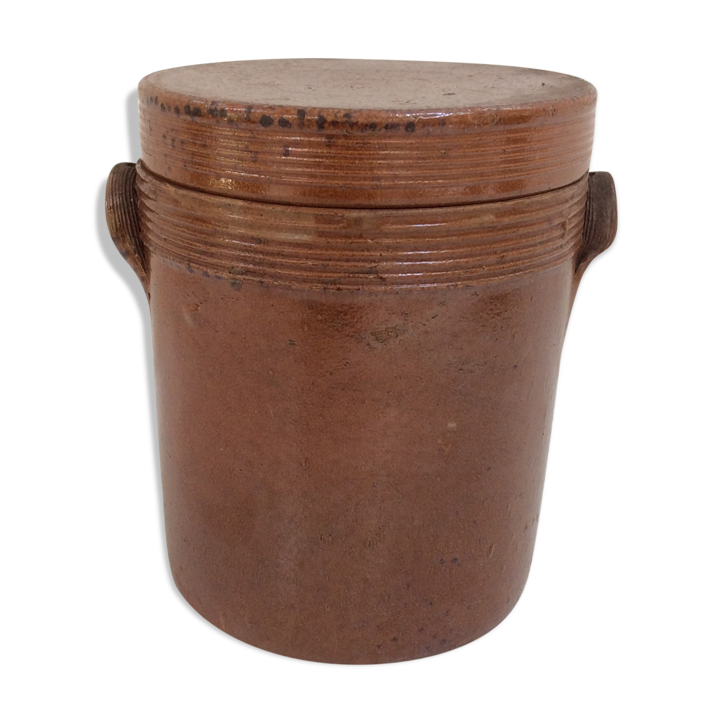 Old stoneware pot with lid