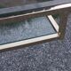 Golden and iridescent metal desk with a glass top from the 70s/80s.