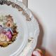 Large serving plate with romantic Frangonard scene with 24 carat gold