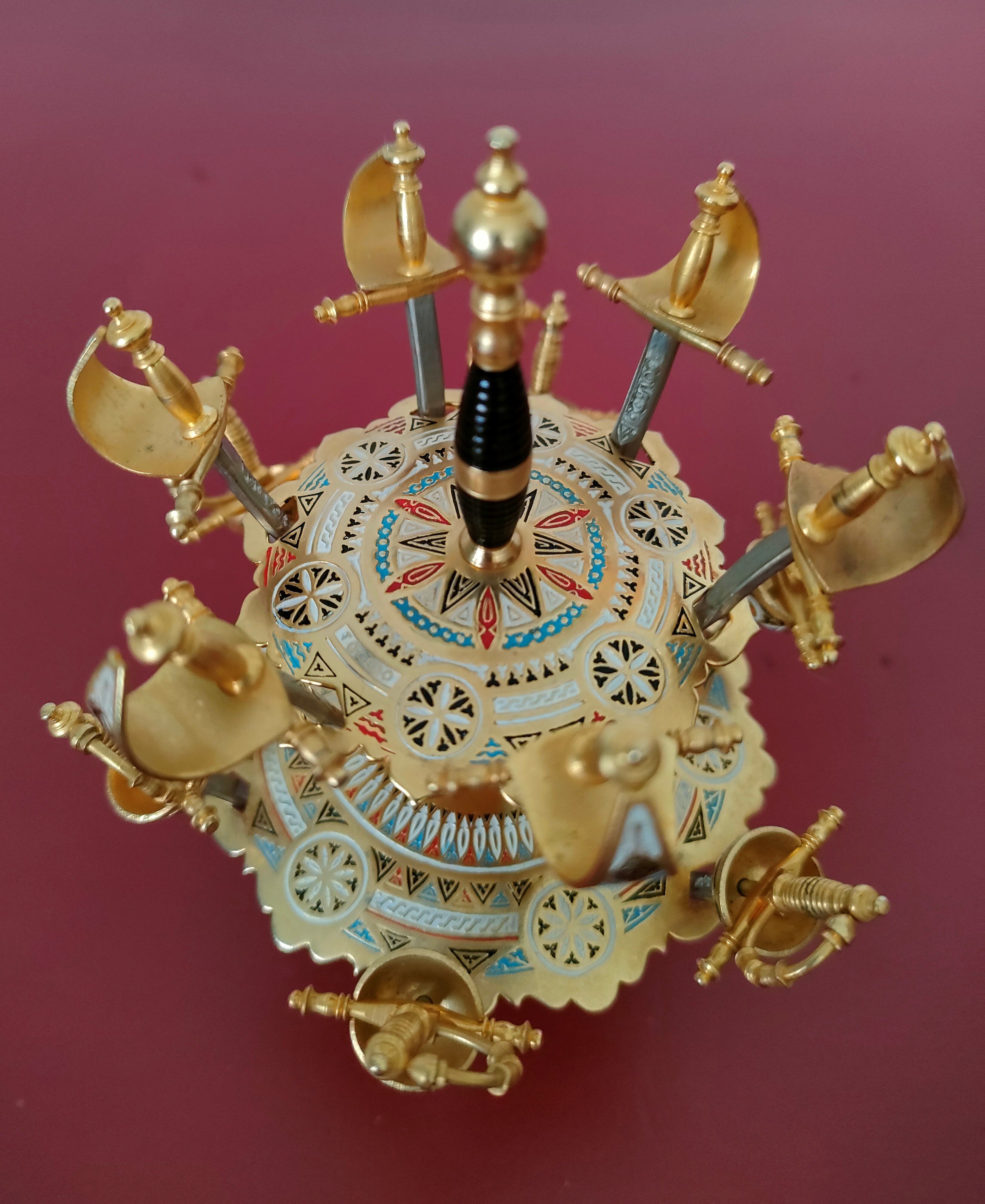 12 aperitif spades in the shape of swords on tray by Toledo Spain 70's