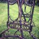 Established solid wood and cast iron console