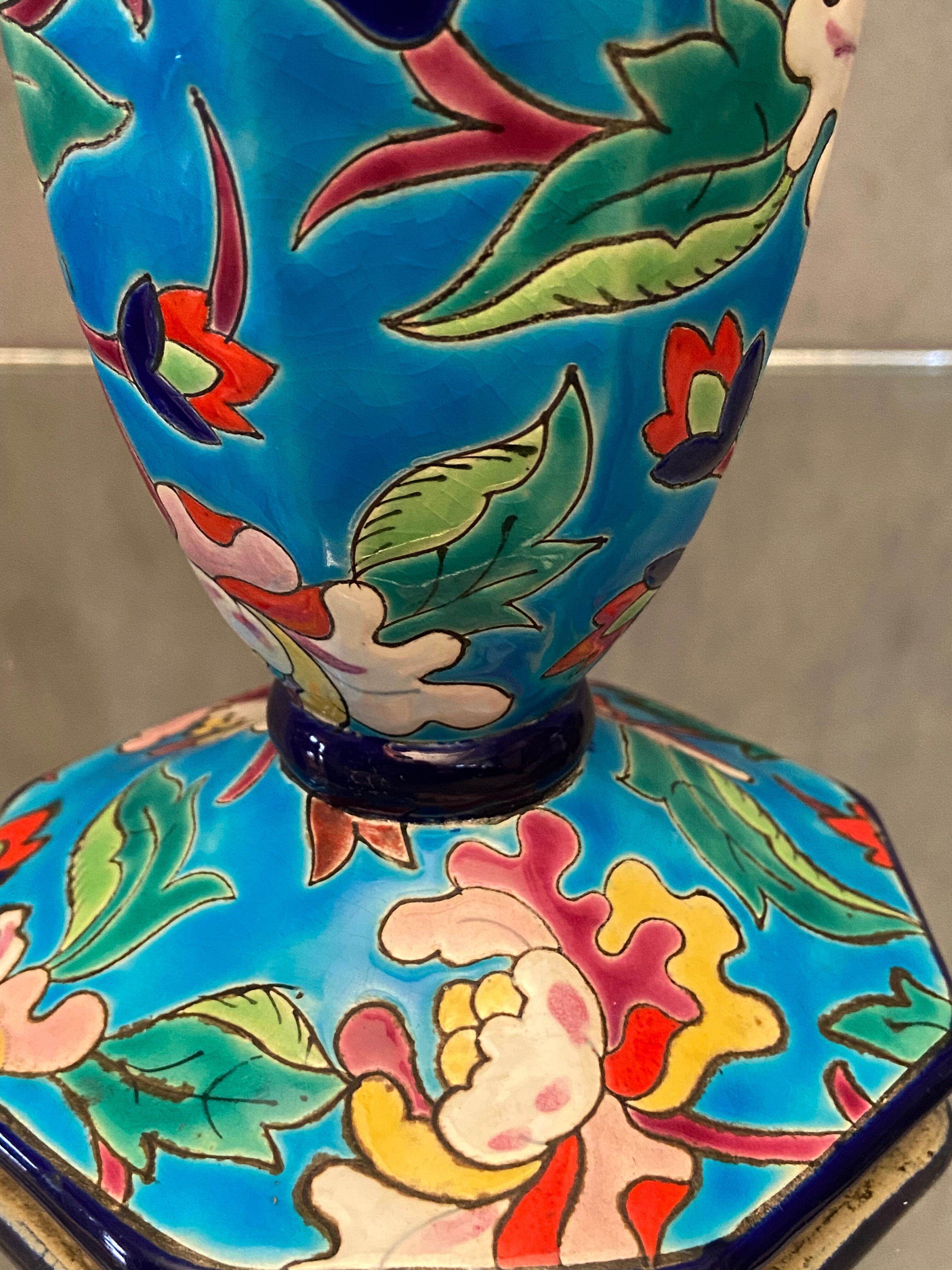Faience cornet vase with floral decoration signed Emaux de Longwy
