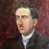 Old oil painting on cardboard portrait of a man in a dark suit