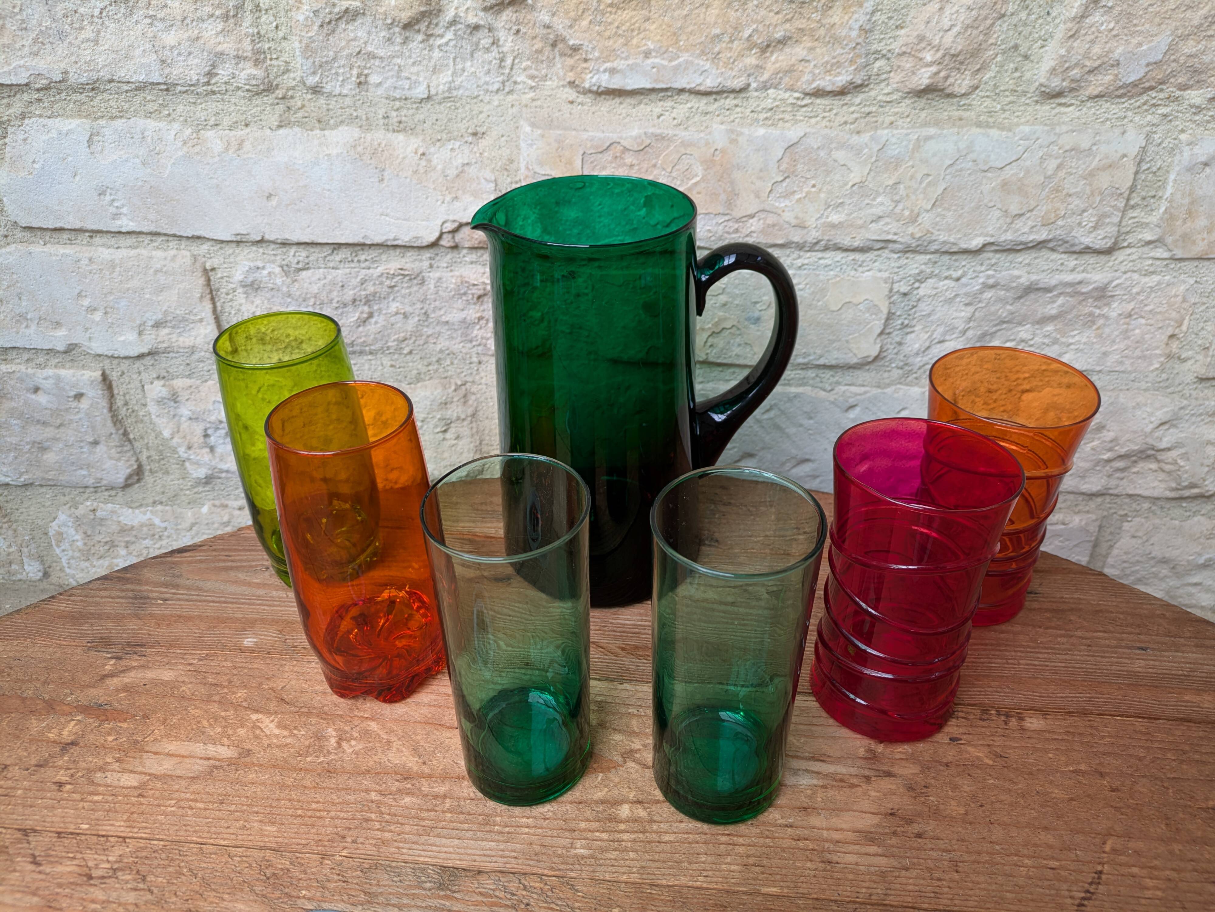 Mismatched colored glass orangeade set with pitcher and 6 glasses
