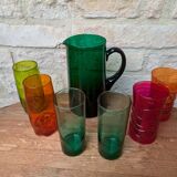 Mismatched colored glass orangeade set with pitcher and 6 glasses