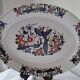 Large oval white ceramic platter, decorated with peacocks and vintage flowers