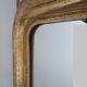 Golden Louis Philippe mirror H122xW84cm with gilded motifs.