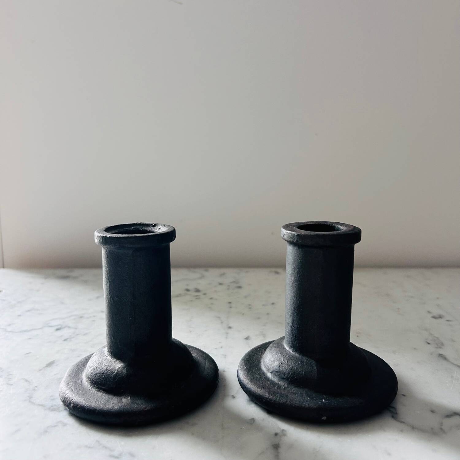 Brutalist cast iron candlestick holders