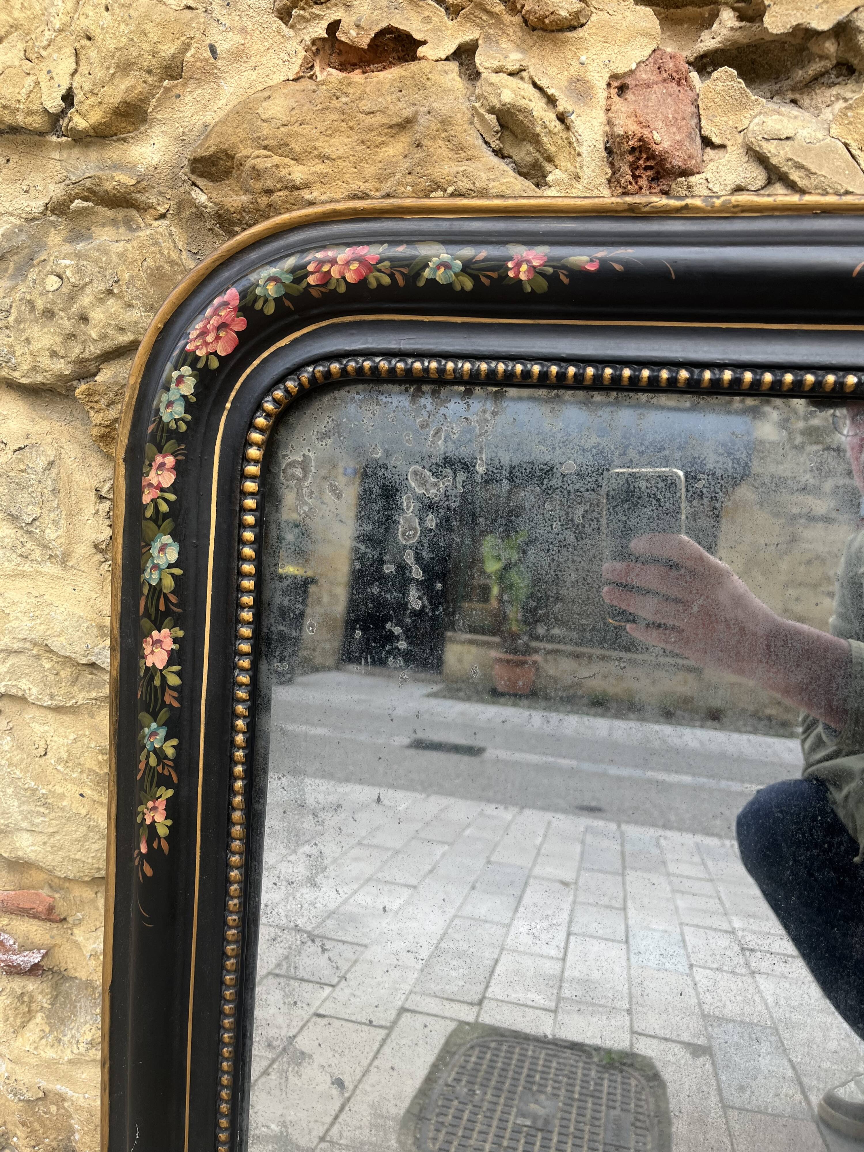 Antique Napoleon III mirror, black frame with hand-painted floral decoration – 19th century