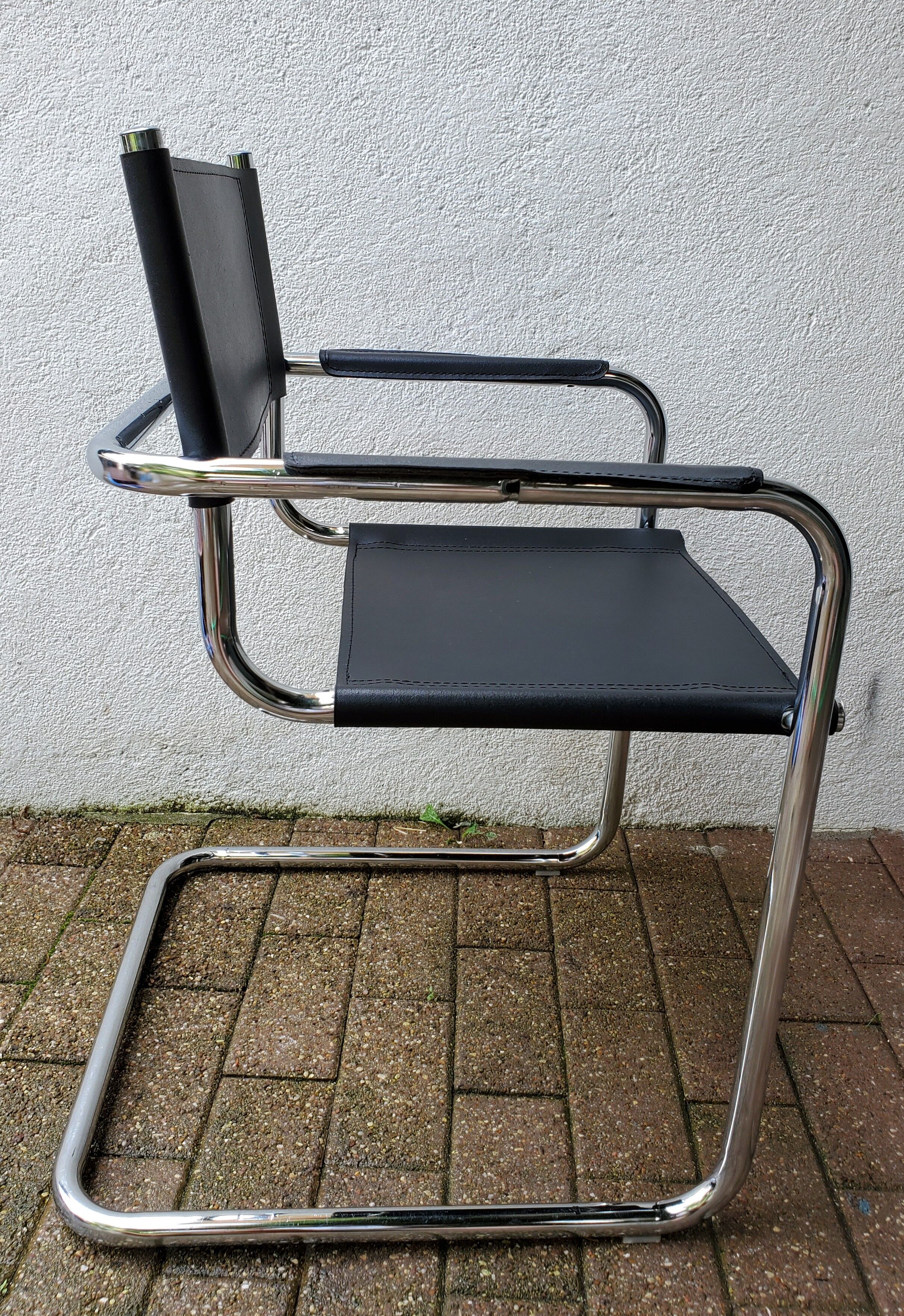 Leather and chrome armchair 70
