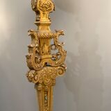 Torchère in gilded wood and carved