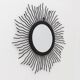 Black metal sunburst wall mirror, round 63x63 cm, vintage 1990s, made in Italy