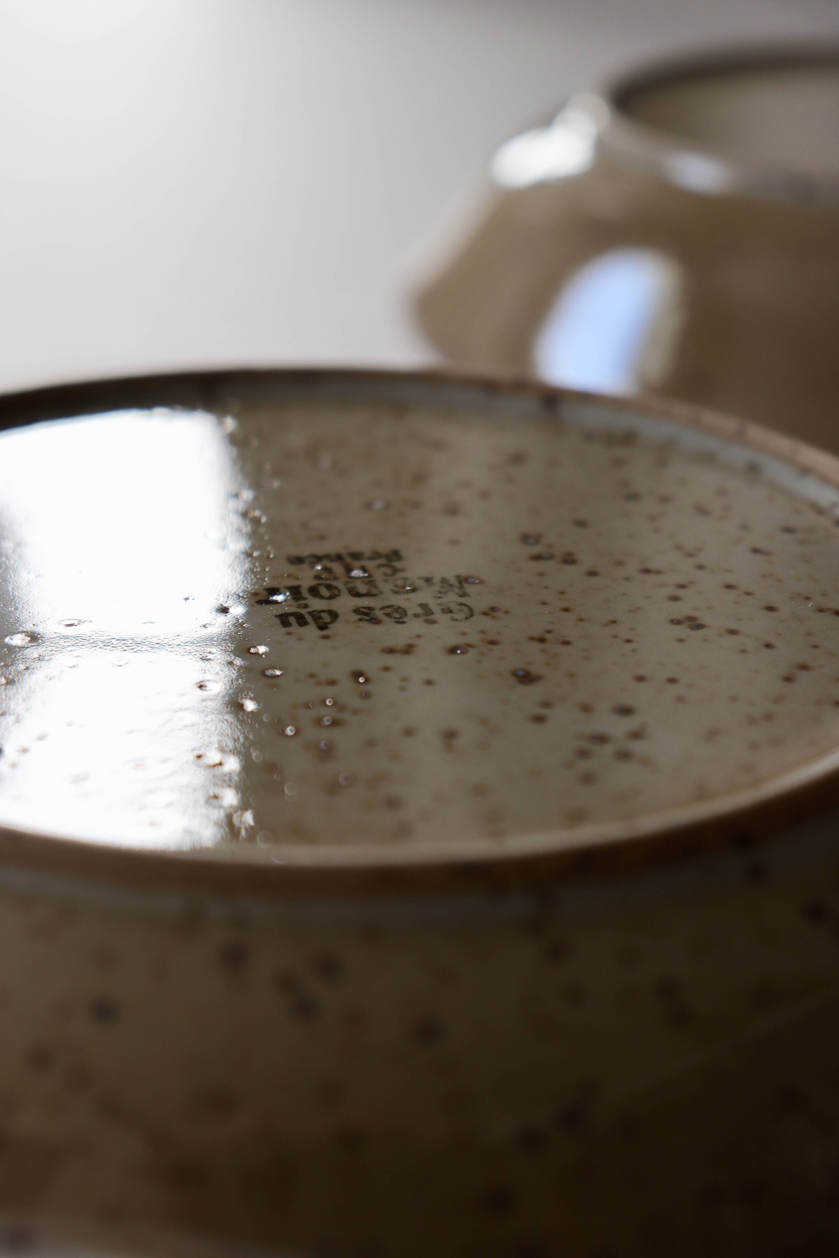 7 speckled stoneware plates
