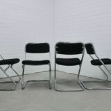vintage set of x4 chrome tubular chairs black rib