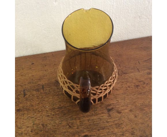 Pitcher dressed in wicker