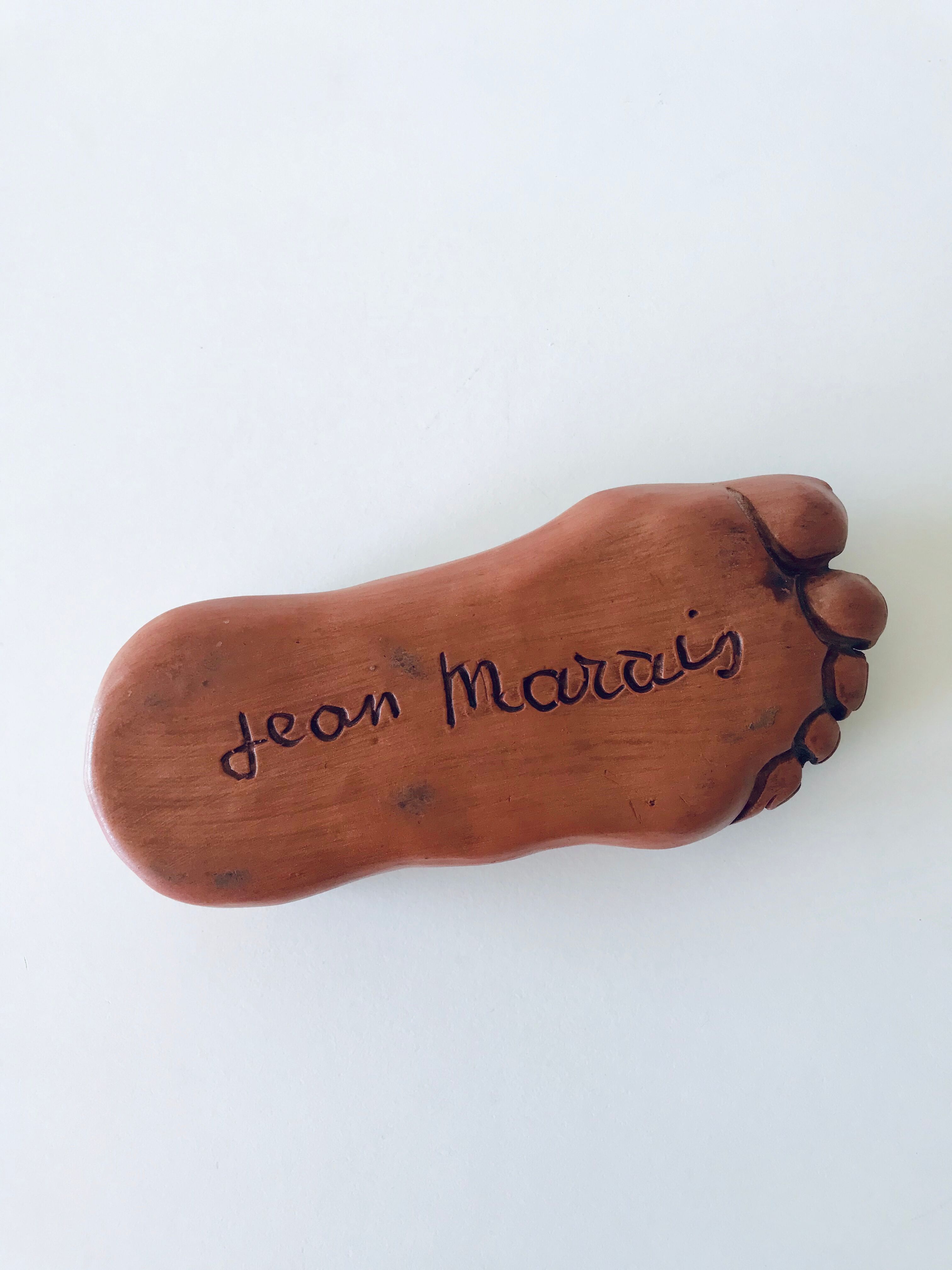 Foot ashtray signed Jean Marais