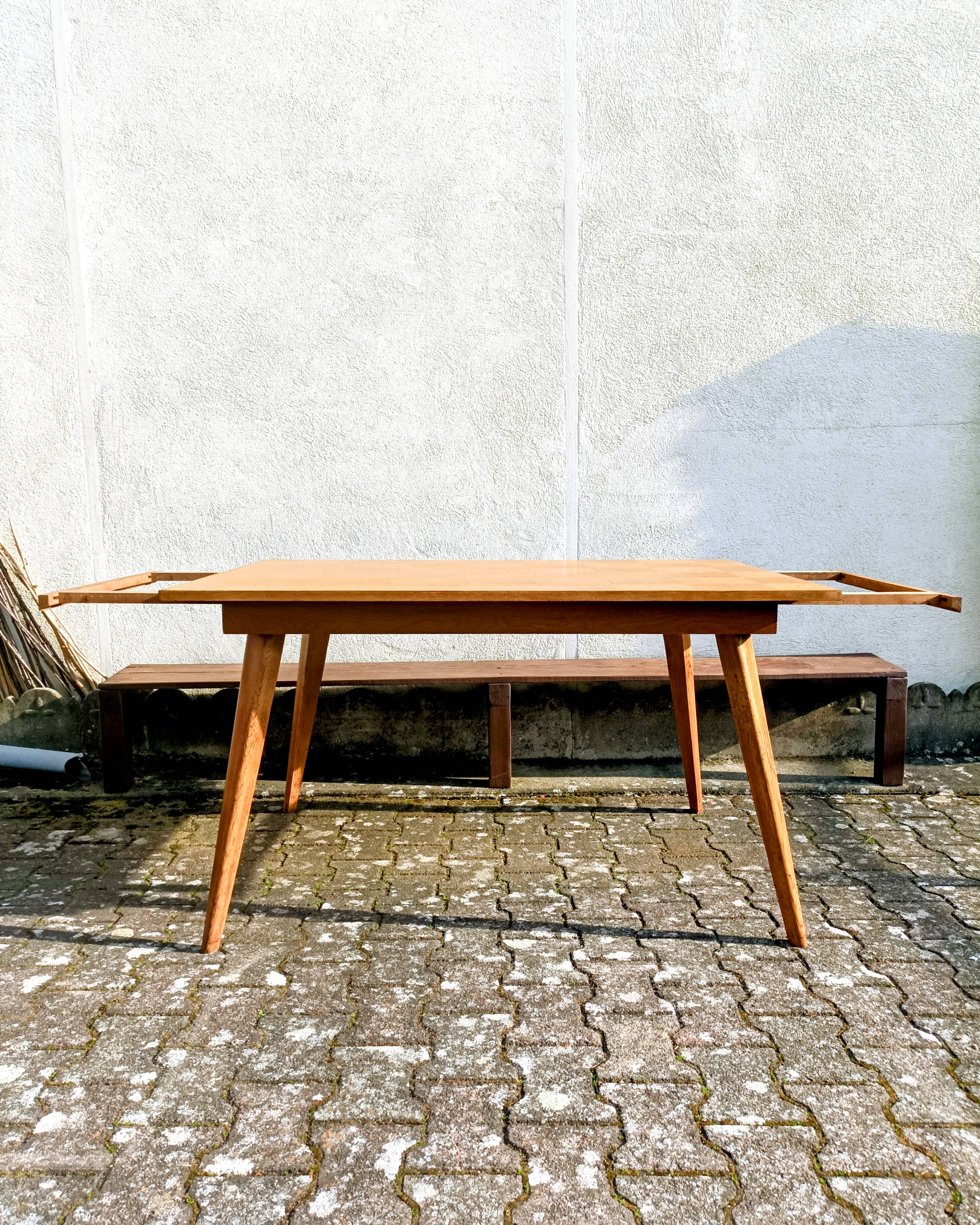 Dining table with tapered legs