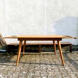 Dining table with tapered legs