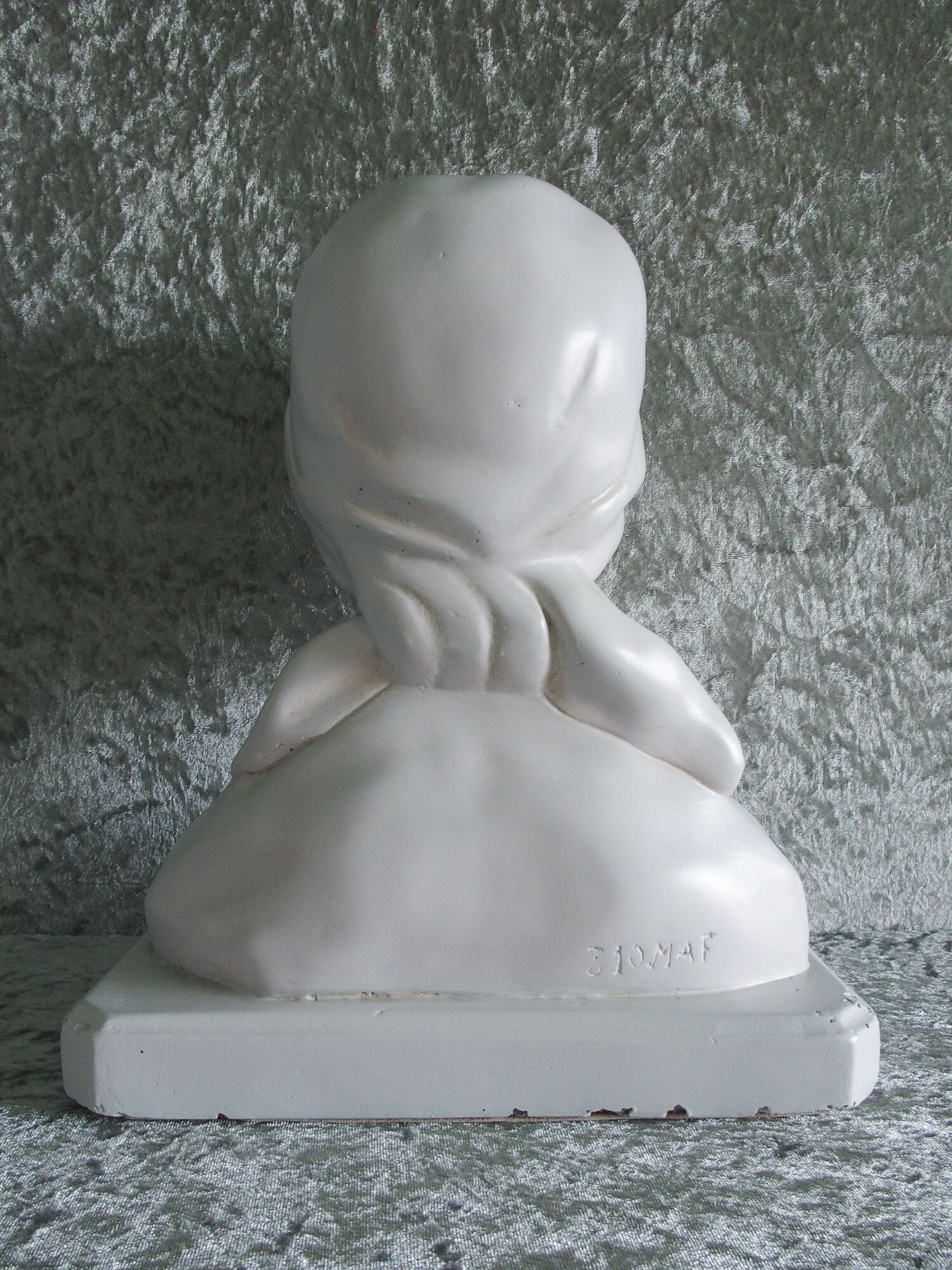 Plaster bust of young peasant girl