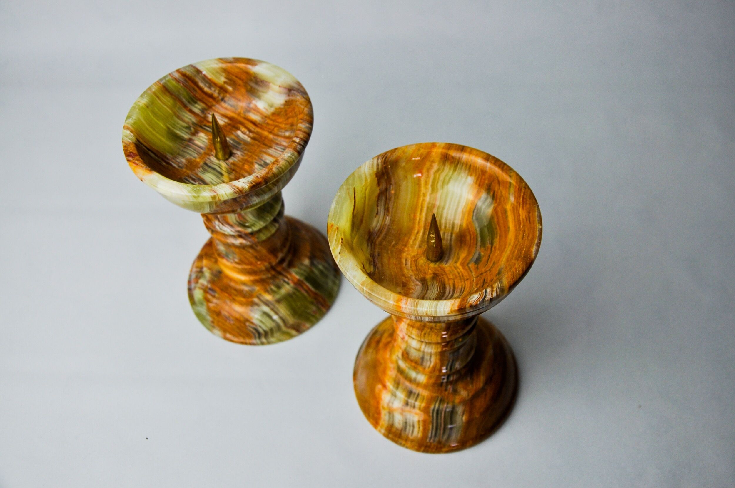 Pair of onyx and brass candle holders, Italy, 1980
