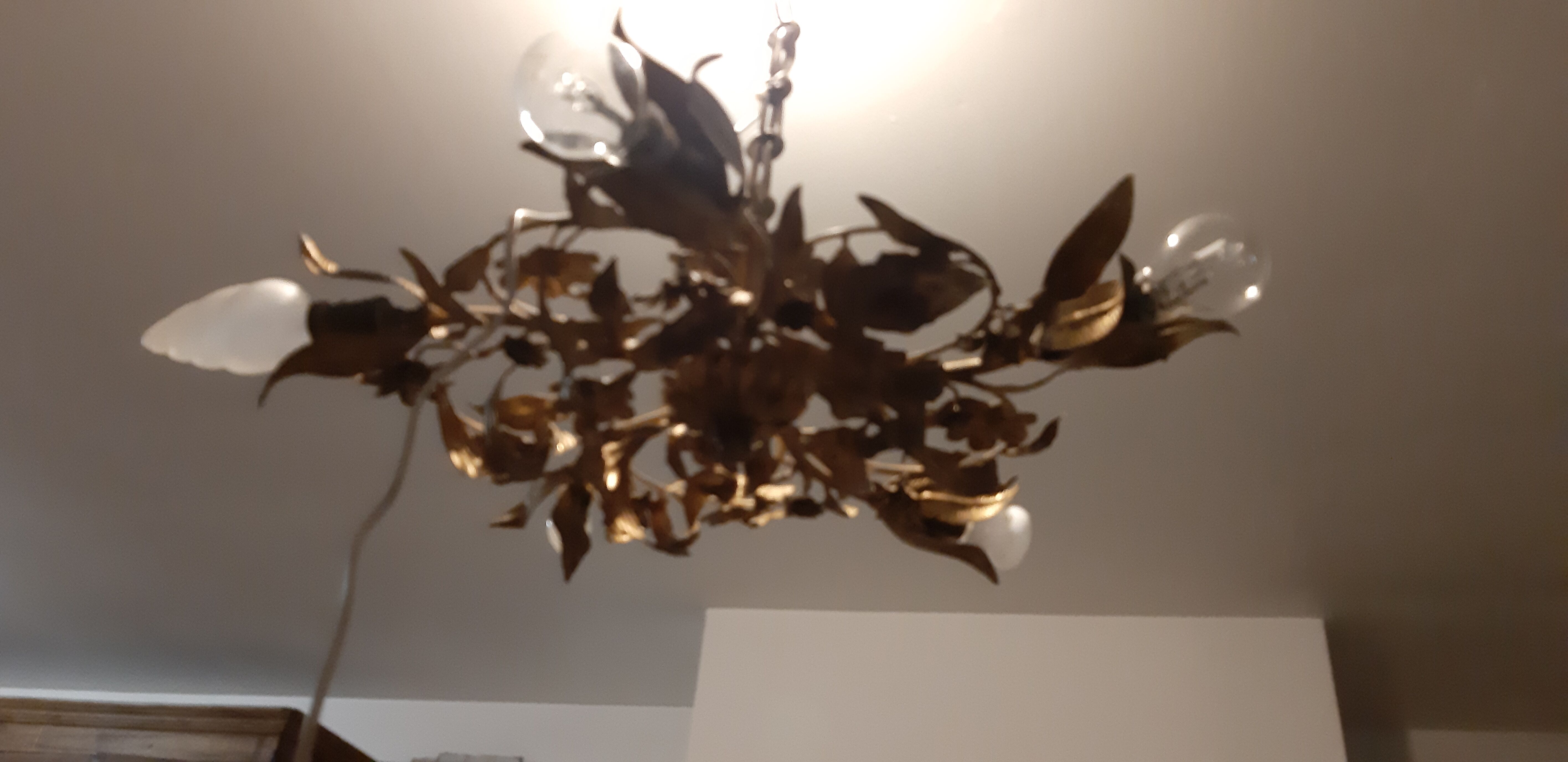 Vintage chandelier in gilded metal