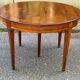 Round extendable dining table Louis XVI in cherry wood from the 1960s.