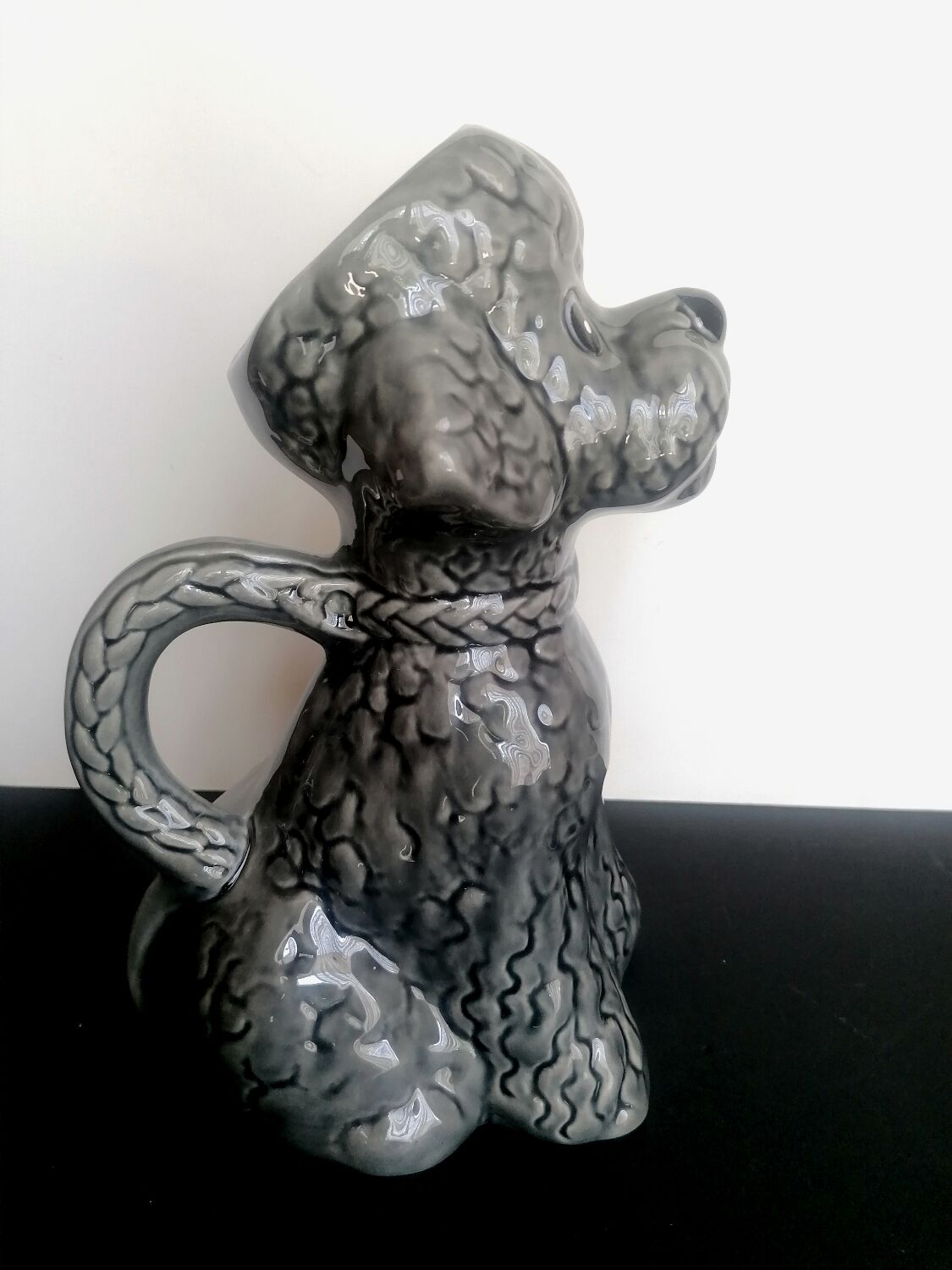 Zoomorphic pitcher slurry poodle