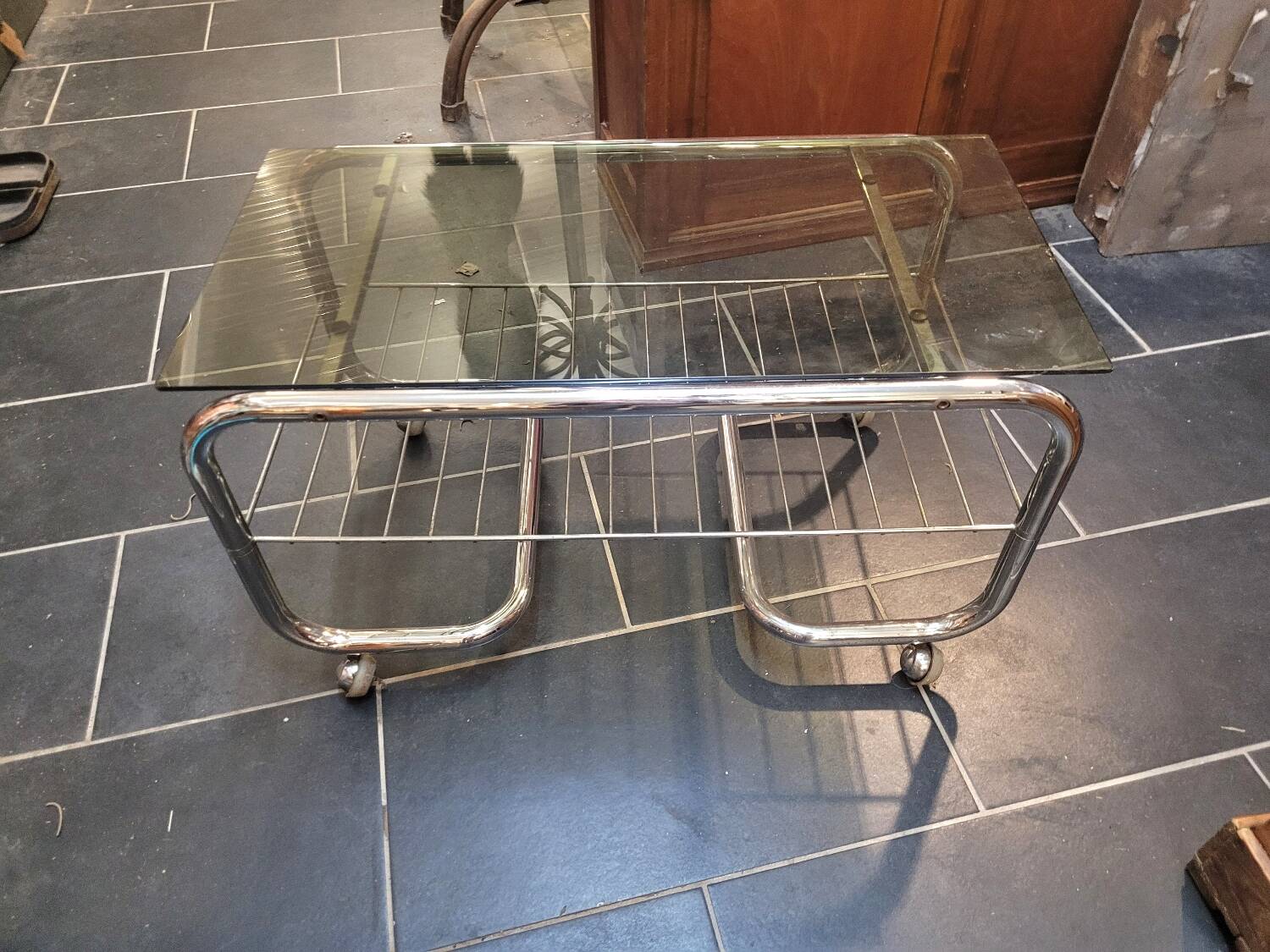 Coffee table with chrome base and smoked glass from the 70s