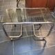 Coffee table with chrome base and smoked glass from the 70s