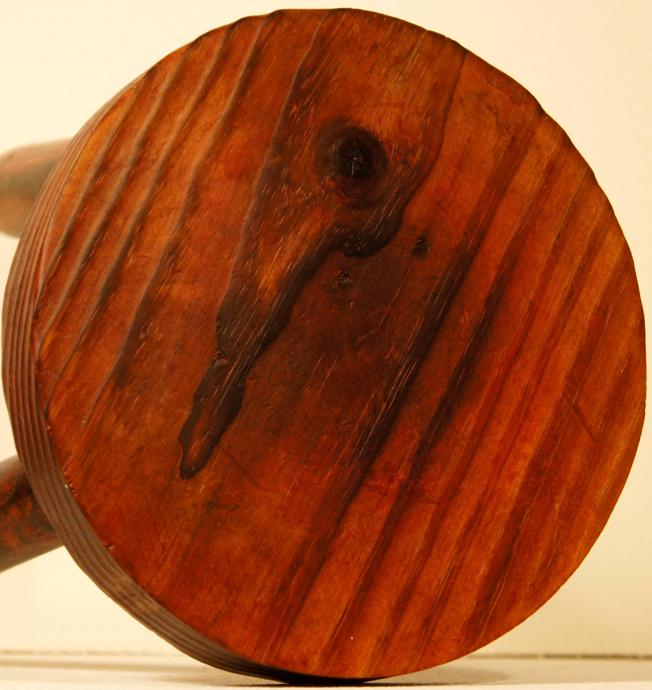 Tripod stool solid wood tinted red